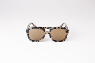 front view of light tortoiseshell large aviator sustainable and biodegradable malone quinoa sunglasses with tan lens