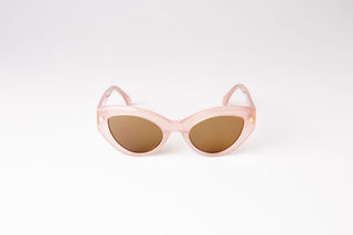 Front view of pink Cleo Floss cateye biodegradable and sustainable sunglasses with tan lens